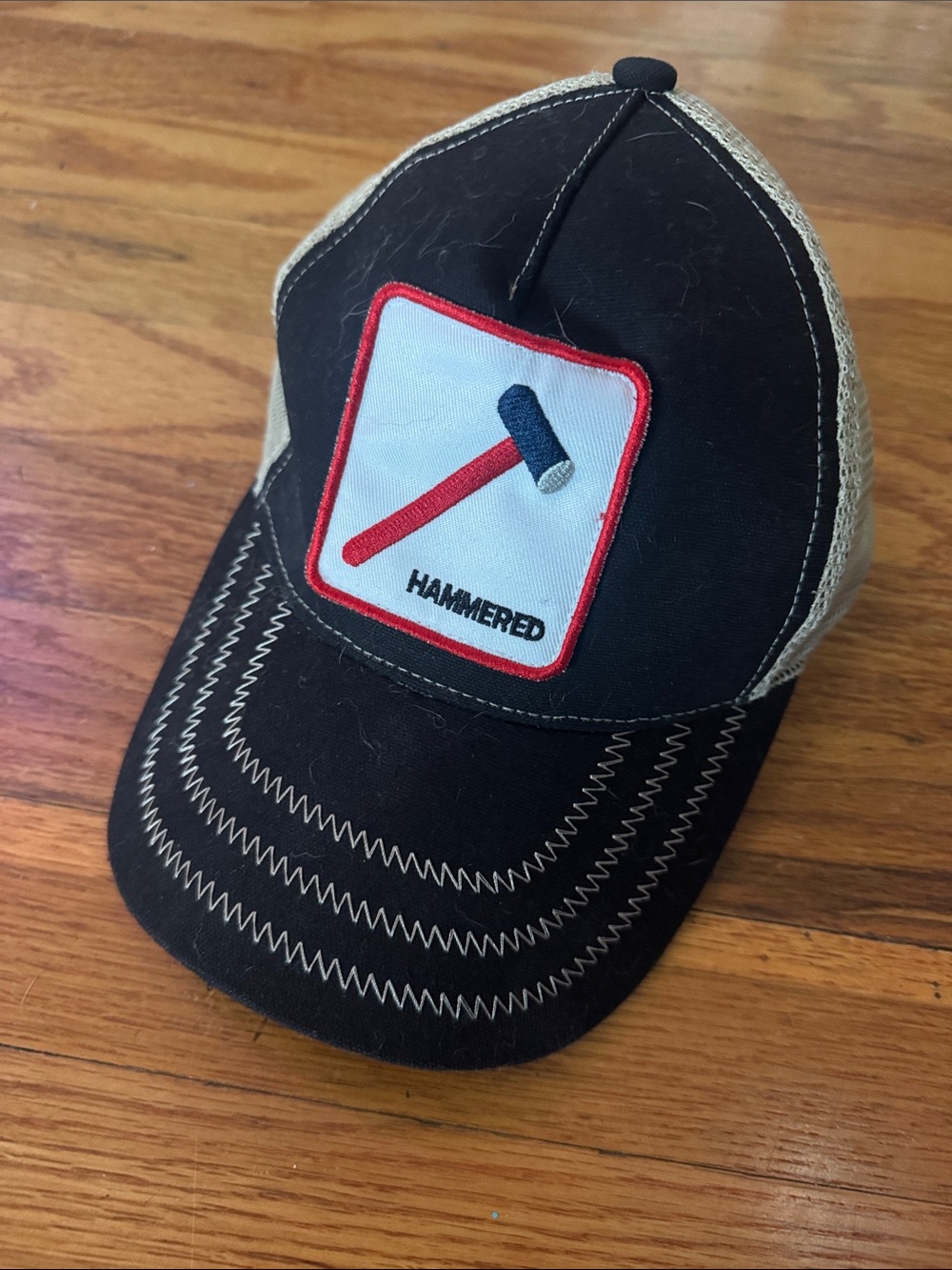Authentic Black & Tan Peter Grimm True Character Hammered Trucker Hat